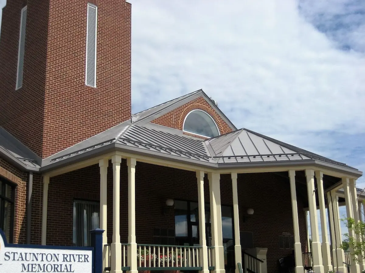 Skilled roofing craftsmen working on a residential roof in South of Conant